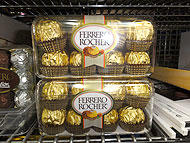 16 chocolates arranged in a 4 by 4 array.