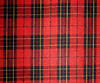 A typical Scottish tartan, making squares and rectangles of various colours.